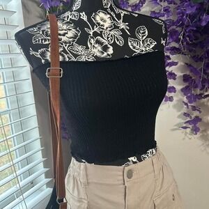 Black ribbed tube top by Bozzolo.